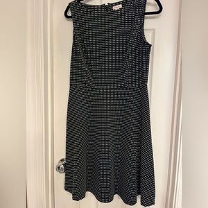Black and white sleeveless dress with zip up back